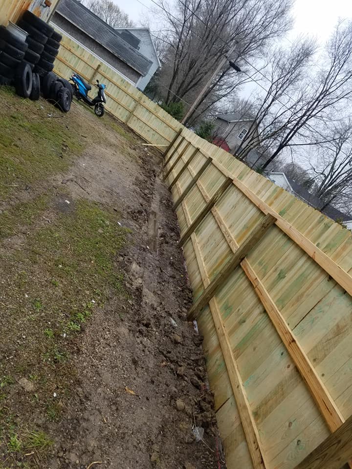 Joe Of All Trades building a wood privacy fence in Decatur, IN