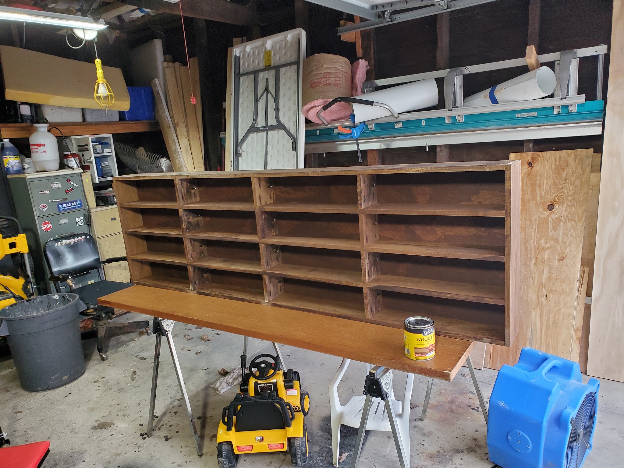 Custom wood shelving unit built in the shop